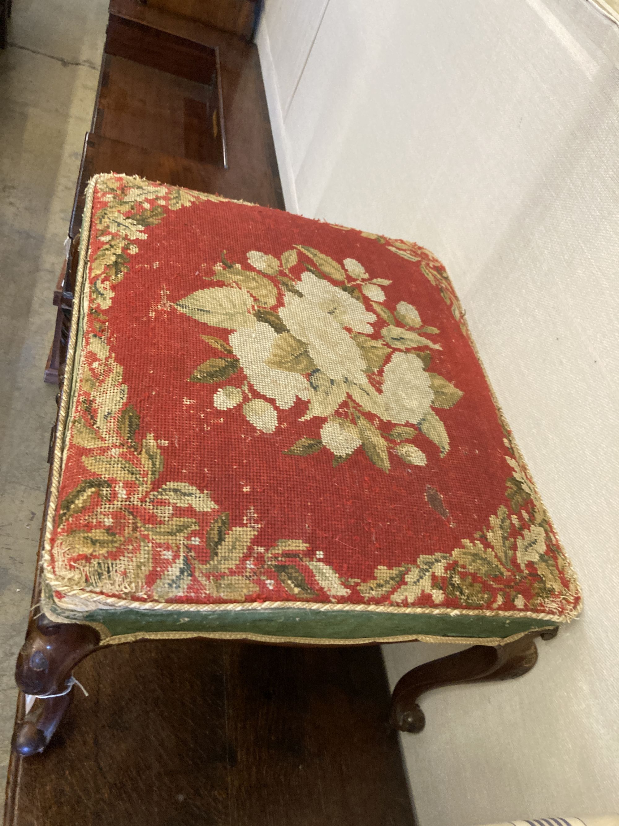 A Victorian walnut dressing stool with tapestry seat, width 66cm, depth 60cm, height 48cm